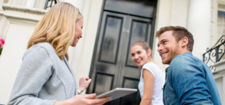 Couple buying a house with a real estate agent