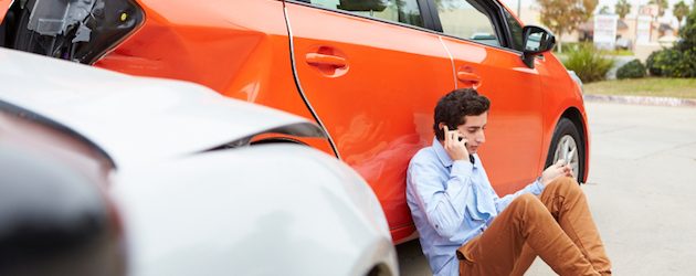 Driver Making Phone Call After Traffic Accident