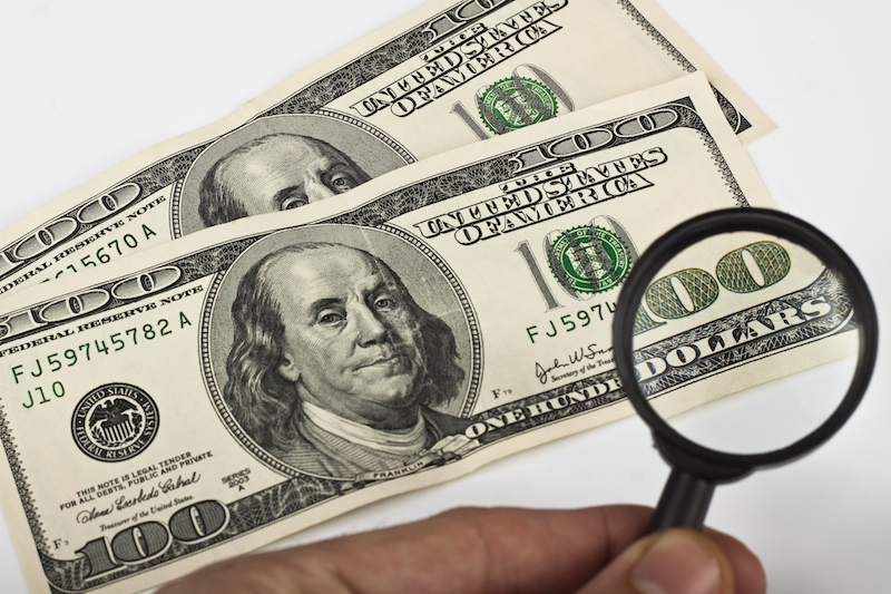 Bills and magnifier
