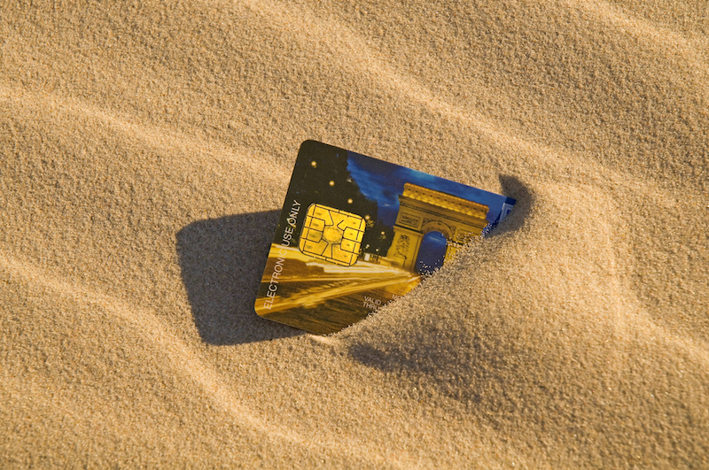 credit card in sand