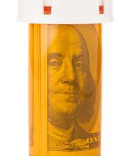 Getty Images - $100 in pill bottle