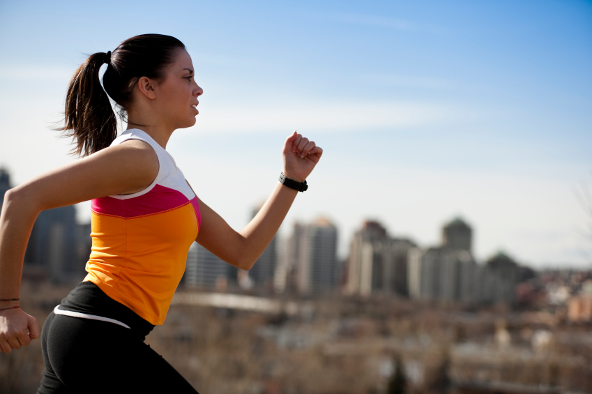 Woman Running in City