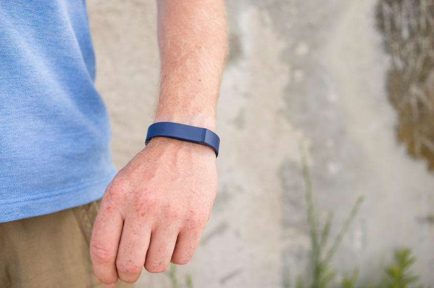 Wearning a Fitbix Flex Activity and Sleep Tracker