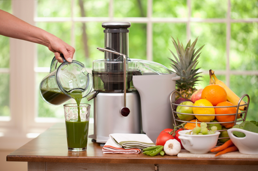 Pouring a Glass of Fresh Organic Green Juice