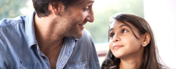 Shot of a father and daughter bonding indoors