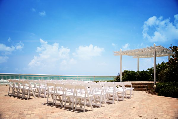 Matthew negotiated the beachside ceremony site fee from $2,000 to $500.